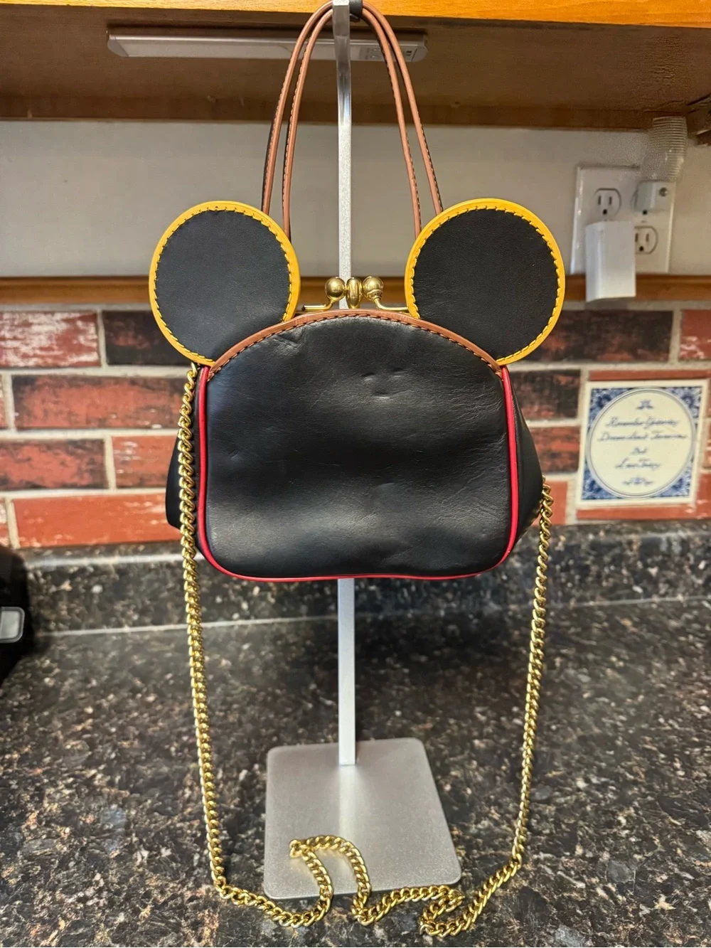 Coach Black Mini Bag with Yellow Ear Trim and Gold Chain